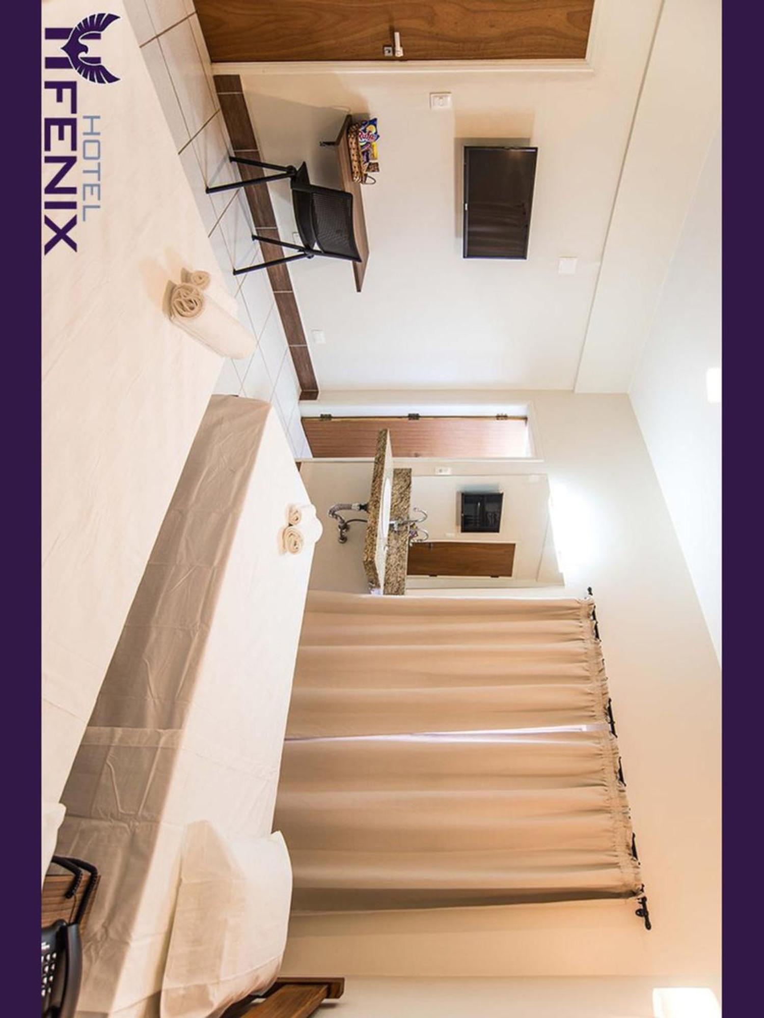 Hotel Fenix Асис Екстериор снимка